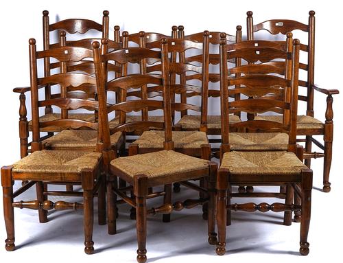 A SET OF TEN OAK AND ASH LANCASHIRE LADDER BACK DINING CHAIRS (10)
