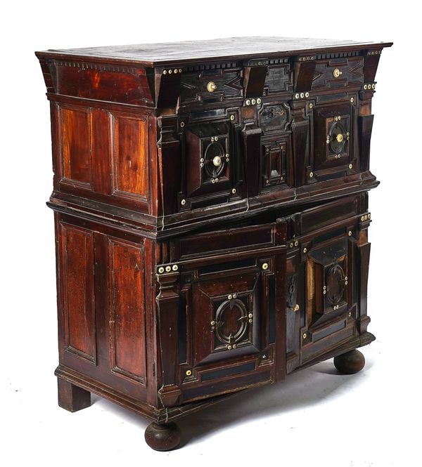 A CHARLES II WALNUT AND EBONY RAISED GEOMETRIC MOULDED CHEST OF DRAWERS