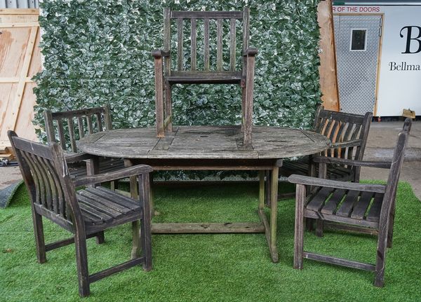 A HARDWOOD OVAL PATIO TABLE