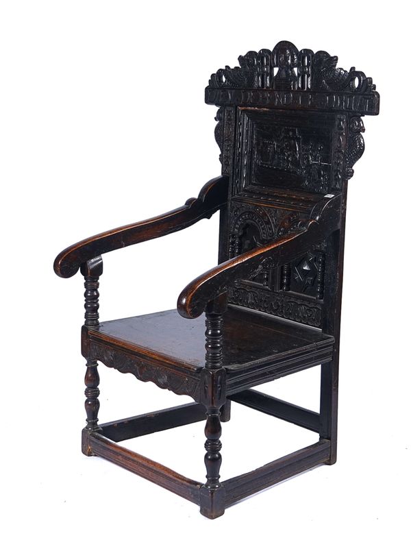 A LATE 17TH CENTURY AND LATER CARVED OAK WAINSCOT CHAIR