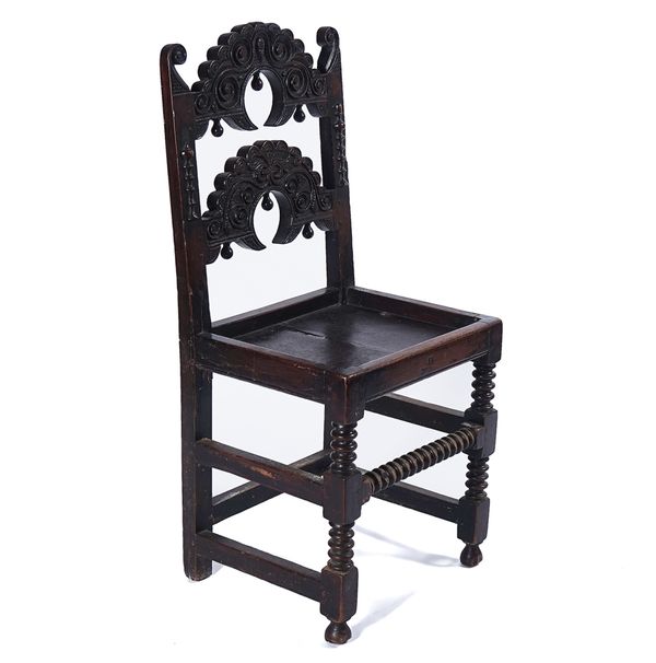 A CHARLES II OAK SINGLE CHAIR