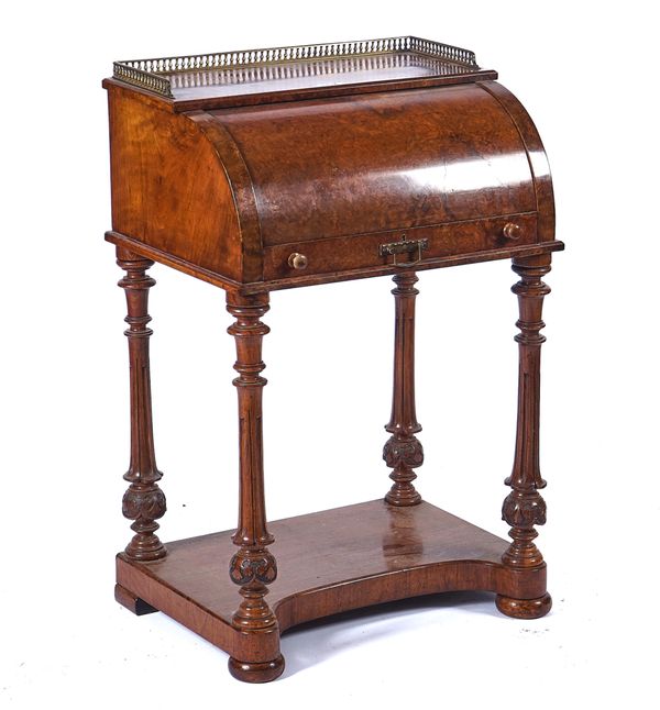 A VICTORIAN FIGURED WALNUT CYLINDER WRITING DESK