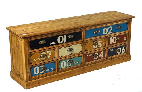 A PINE LOW BANK OF TEN DRAWERS