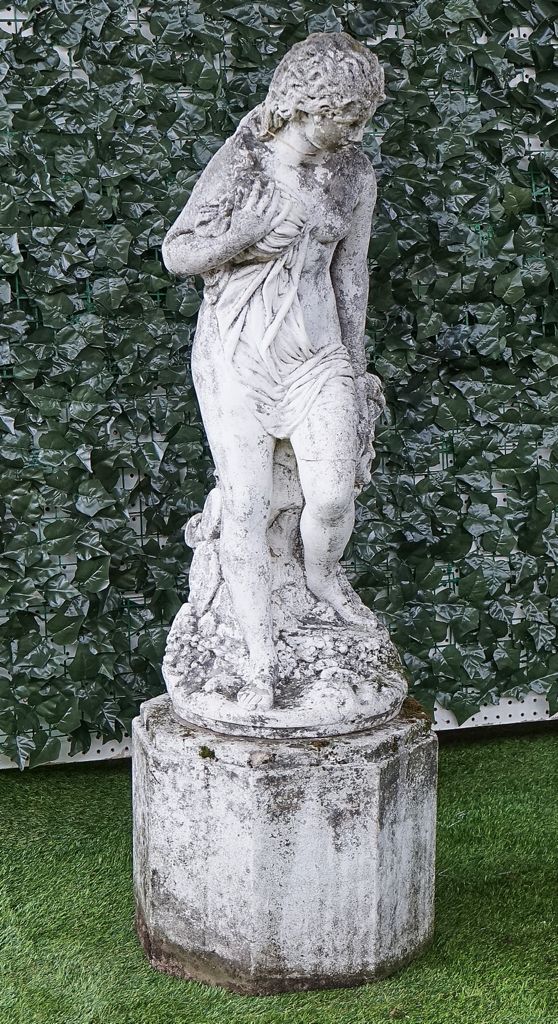 A WHITE PAINTED RECONSTITUTED STONE FIGURE OF ANDROMEDA