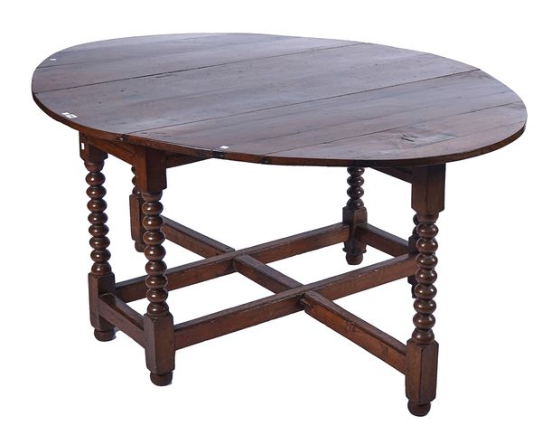 A LATE 17TH CENTURY AND LATER ENGLISH OAK GATE-LEG TABLE
