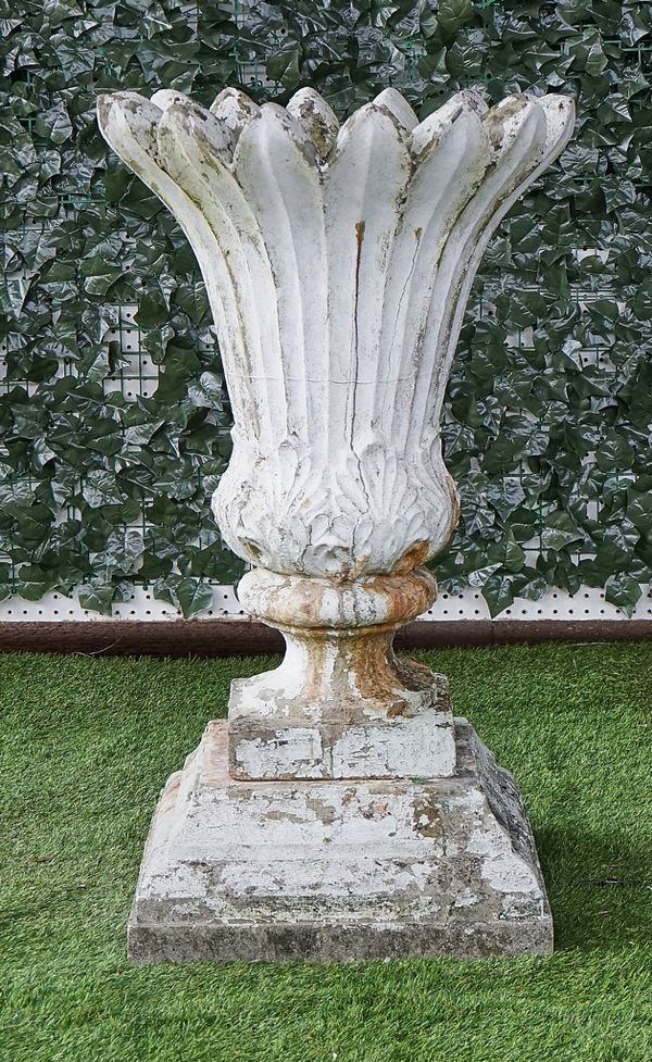 A RECONSTITUTED STONE WHITE PAINTED JARDINIERE