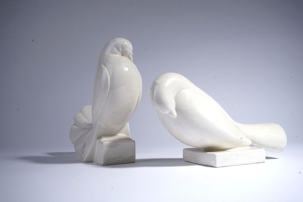 JACQUES ADNET (FRENCH, 1901-1984) A PAIR OF EARTHENWARE CREAM GLAZED DOVES (2)