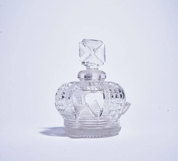 A CUT GLASS OPENWORK CROWN SCENT BOTTLE AND STOPPER (2)