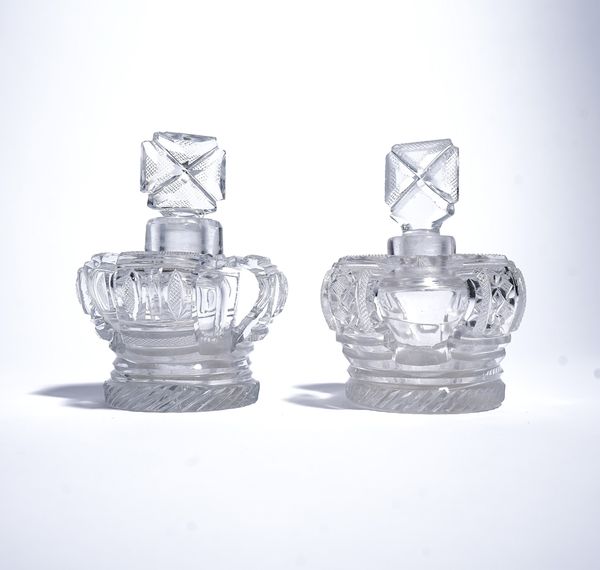 TWO CUT GLASS OPENWORK CROWN SCENT BOTTLES AND STOPPERS (4)