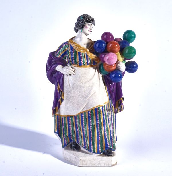 CHARLES VYSE ( 1882-1971) `THE BALLOON SELLER', A CHELSEA POTTERY FIGURE