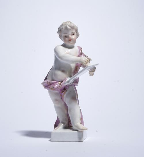 A MEISSEN FIGURE OF A PUTTO FROM THE WARSAW HOFKONDITORERI