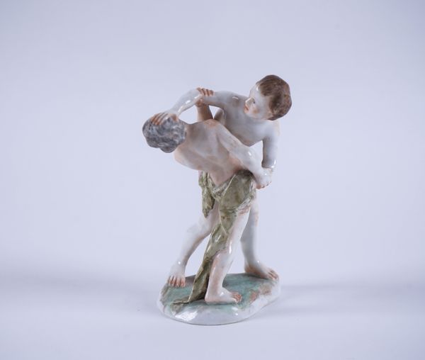 A PORCELAIN GROUP OF TWO WRESTLERS