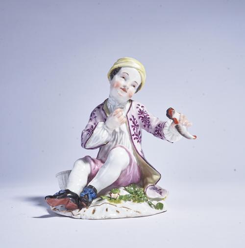 A MEISSEN FIGURE OF A FISHER BOY