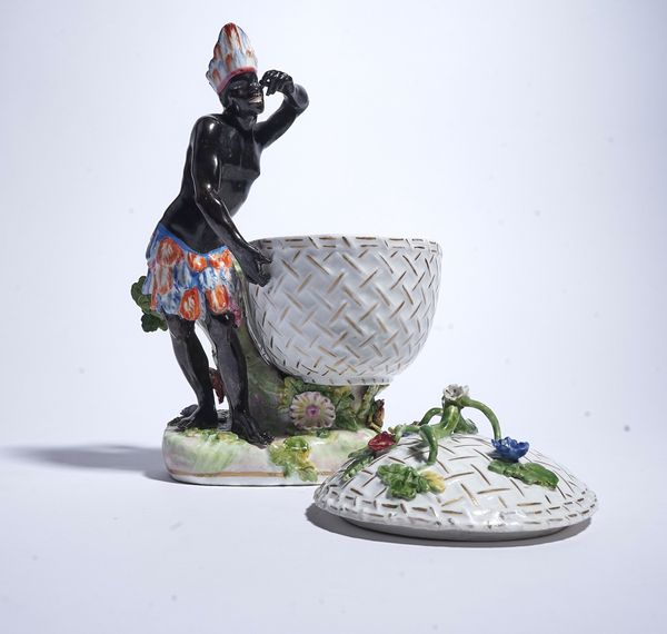 A MEISSEN BLACKAMOOR FIGURE WITH COVERED BOWL (2)