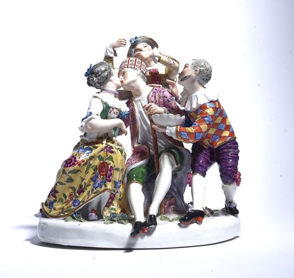 A CONTINENTAL PORCELAIN GROUP OF `THE MOCKERY OF AGE'