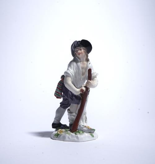 A MEISSEN FIGURE OF A REAPER
