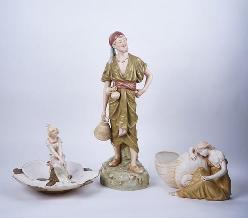 A ROYAL DUX FIGURE OF AN EASTERN WATER CARRIER (3)