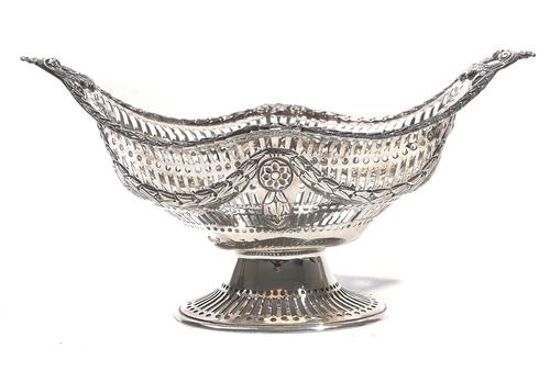 A SCOTTISH SILVER TWIN HANDLED PEDESTAL BASKET