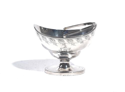 A GEORGE III SILVER SUGAR BASKET