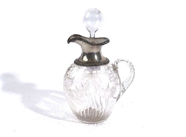 A LATE VICTORIAN SILVER MOUNTED GLASS CLARET JUG