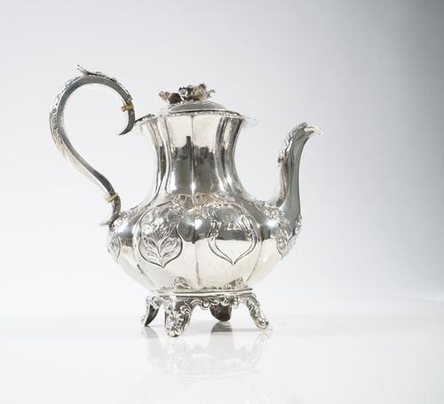 A WILLIAM IV SILVER HOT WATER JUG