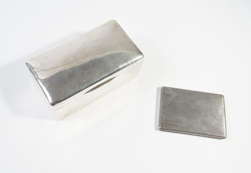 A SILVER TABLE CIGARETTE BOX AND A SILVER CIGARETTE CASE (2)