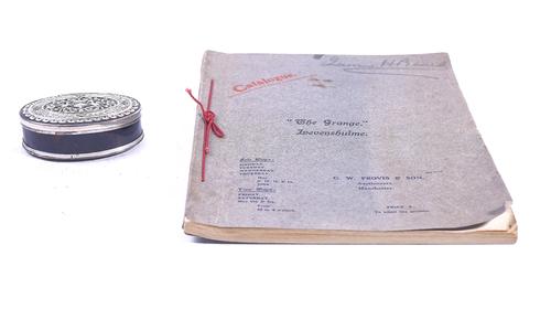 A SILVER MOUNTED OVAL TORTOISESHELL HINGE LIDDED ROYALIST SNUFF BOX