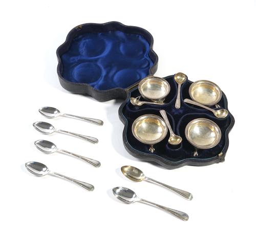 A SET OF FOUR VICTORIAN SILVER SALTS WITH SPOONS AND ANOTHER SET OF SPOONS