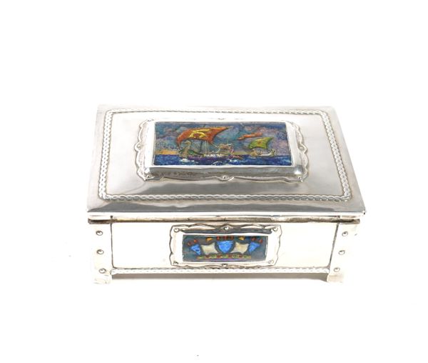 AN ARTS & CRAFTS SILVER AND ENAMEL MOUNTED TABLE CIGARETTE BOX OF NAVAL INTEREST