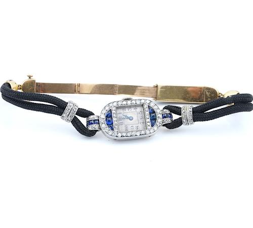A FRENCH PLATINUM, SAPPHIRE AND DIAMOND LADY'S DRESS WRISTWATCH