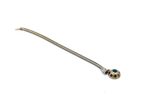 A VICTORIAN GOLD BRACELET WITH A RED AND GREEN ENAMEL PENDANT LOCKET