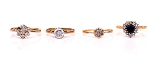 FOUR GOLD AND GEM SET RINGS (4)