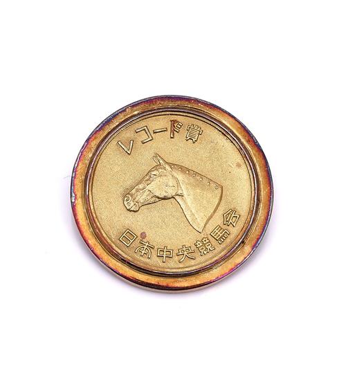 A JUPITER ISLAND GOLD MEDALLION