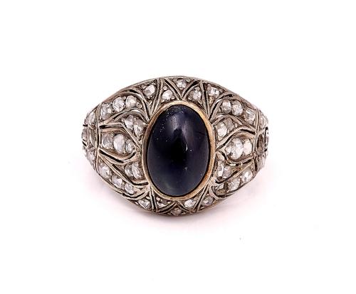 A ROSE DIAMOND AND CABOCHON BLUE GEM SET RING