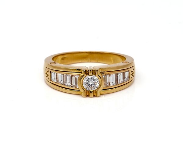 A FRENCH GOLD AND DIAMOND RING