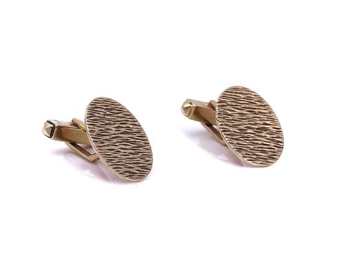 A PAIR OF GOLD CUFFLINKS