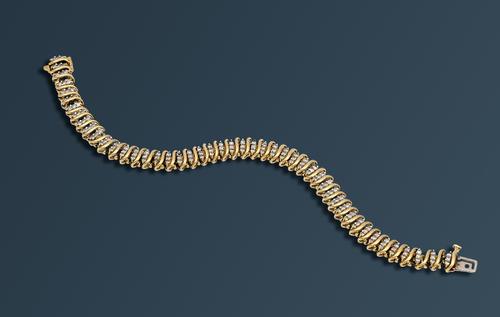 A GOLD AND DIAMOND BRACELET