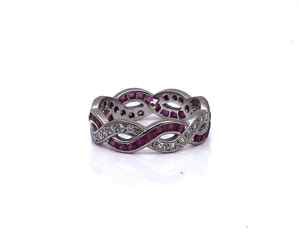 A DIAMOND AND RUBY FULL ETERNITY RING
