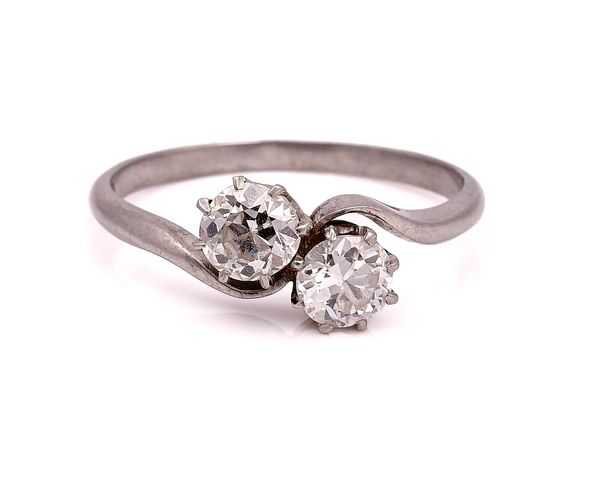 A PLATINUM AND DIAMOND TWO STONE RING