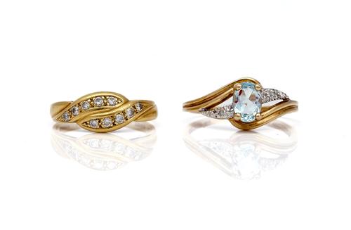 TWO GOLD AND GEM SET RINGS (2)