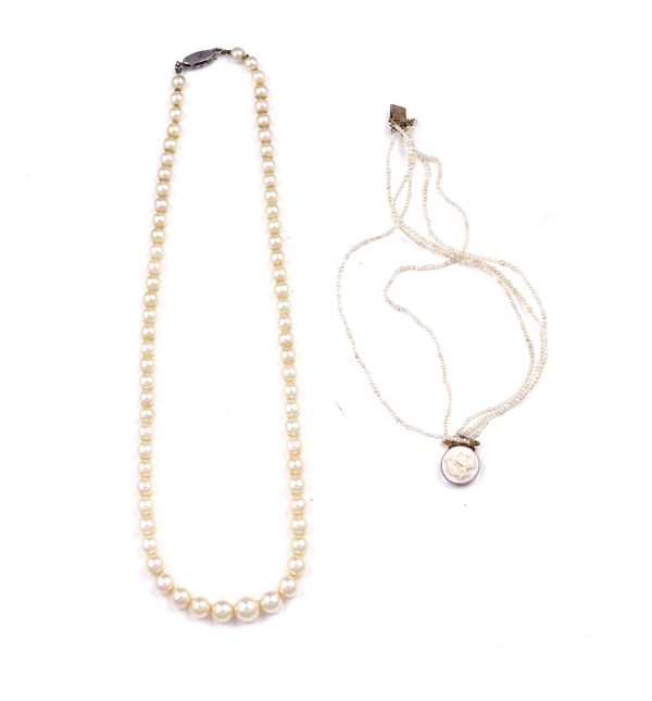 A SINGLE ROW NECKLACE OF GRADUATED CULTURED PEARLS AND A BRACELET (2)