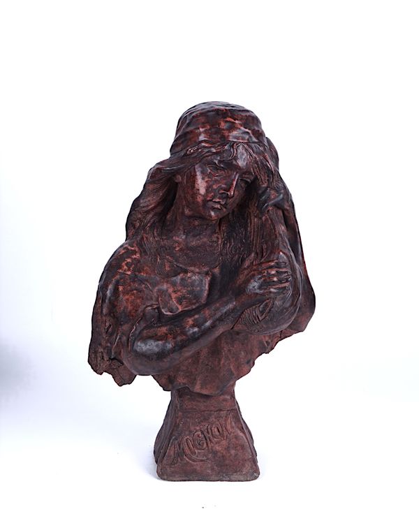 A RED AGGREGATE BUST OF A LADY HOLDING A MANDOLIN DETAILED 'MIGNON'