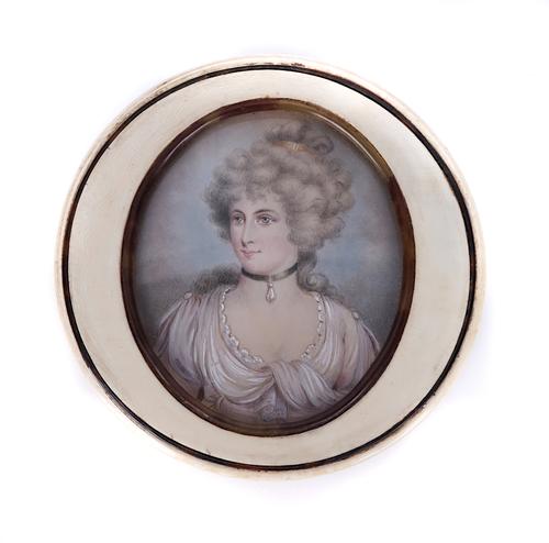 A CIRCULAR IVORY BOX AND COVER