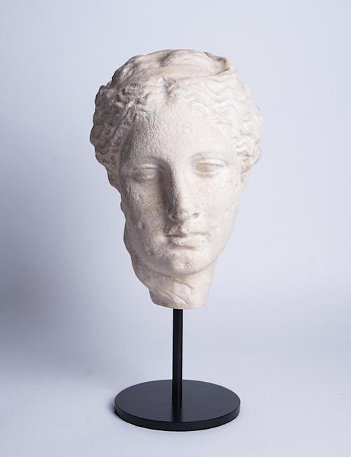 AFTER THE ANTIQUE, A WHITE RESIN BUST 'VENUS DE MILO'