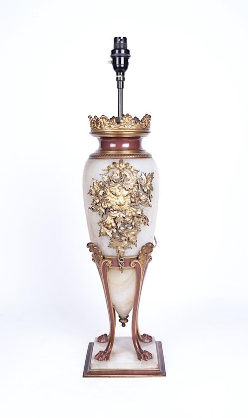 A FRENCH GILT AND PATINATED BRONZE MOUNTED ONYX AMPHORA SHAPED TABLE LAMP
