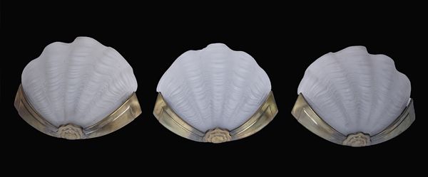FIVE ART DECO BRASS AND FROSTED GLASS 'SCALLOP SHELL' WALL LIGHTS