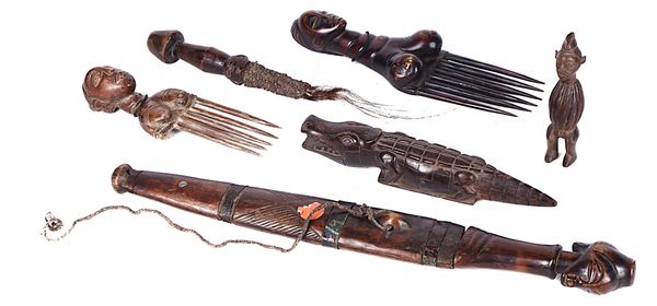 A GROUP OF CARVED WOOD ARTEFACTS, INCLUDING TWO COMBS, A FLY WHISK, RELIQUARY FIGURE, DAGGER AND SHEATH, DEMOCRATIC REPUBLIC OF CONGO (6)