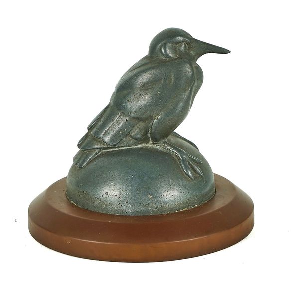 CLIENT COLLECTING - A PEWTER SCULPTURE OF A BIRD