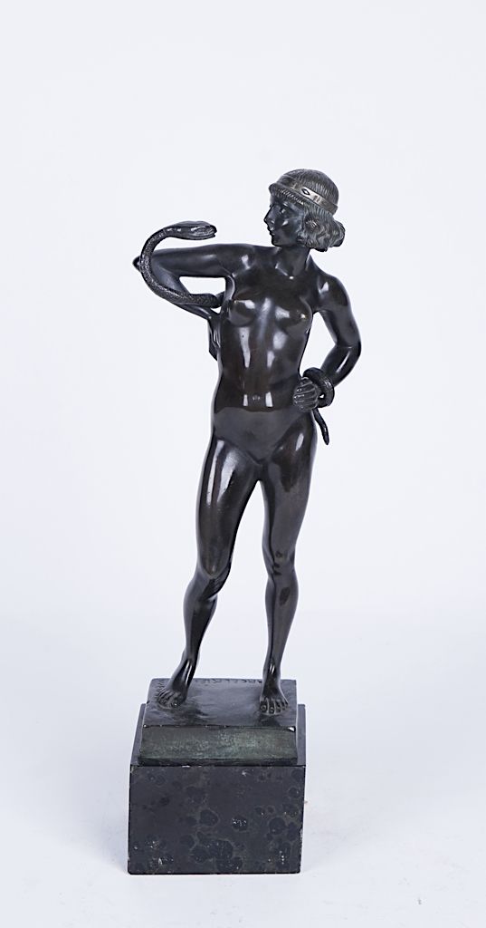 MARCEL KLEINE; AN ART DECO PATINATED BRONZE SCULPTURE OF A NUDE FEMALE WITH A SERPENT,
