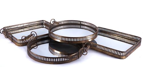 FOUR GILT-METAL MOUNTED MIRROR GLASS SERVING TRAYS (4)